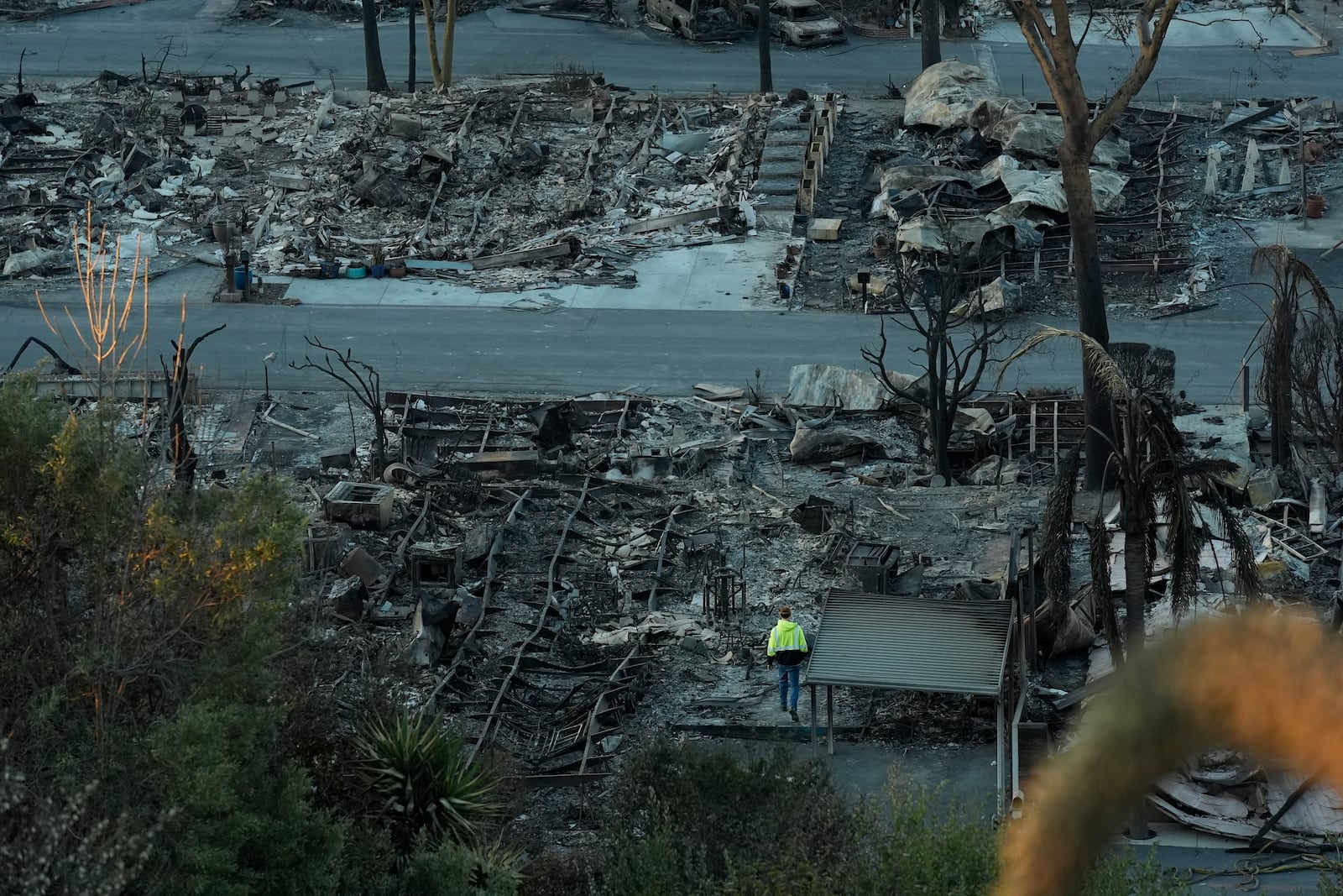 Homes at the Pacific Palisades Bowl Mobile Estates destroyed by the Palisades Fire are seen in the Pacific Palisades neighborhood of Los Angeles, Thursday, Jan. 16, 2025. (AP Photo/Damian Dovarganes)