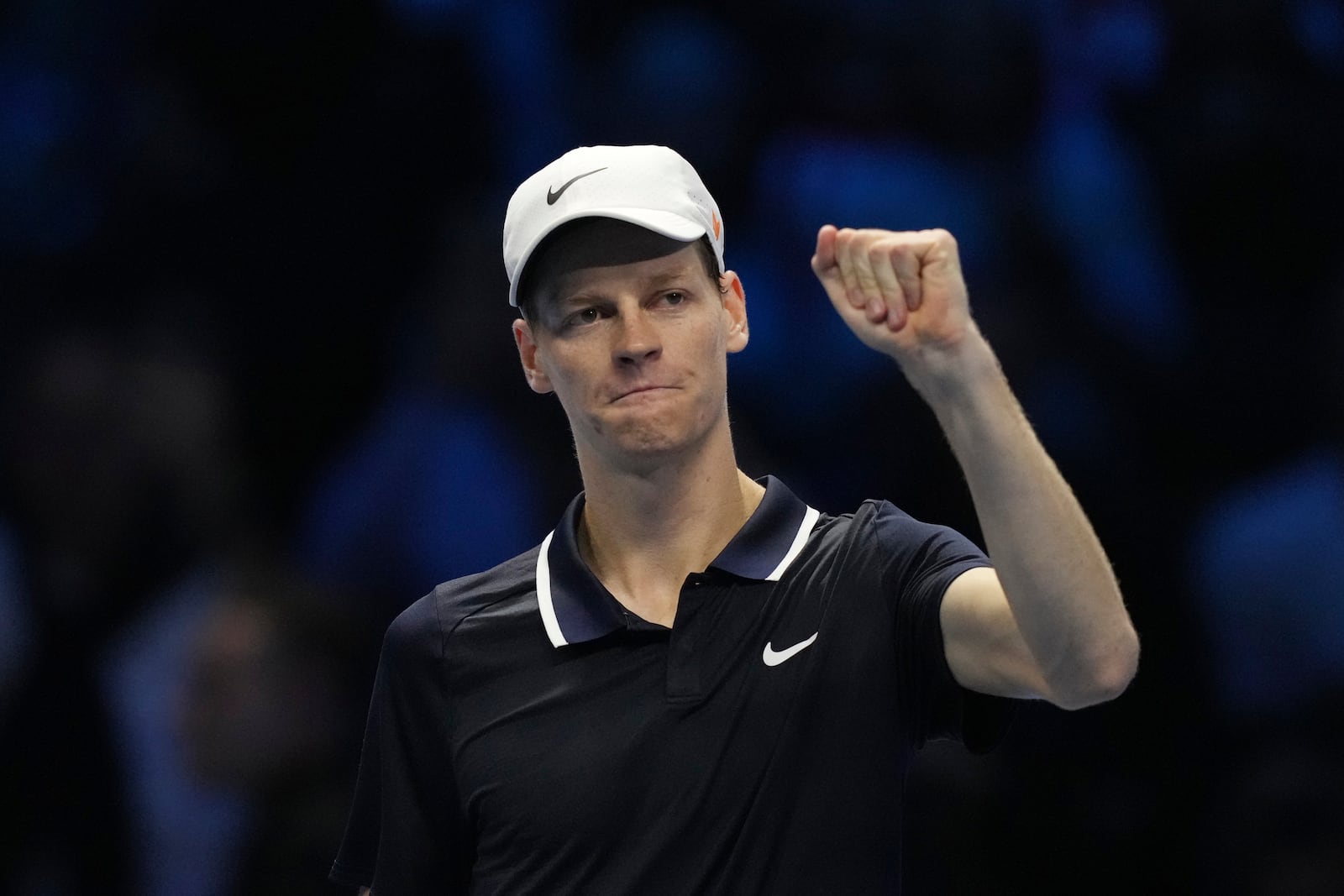 Italy's Jannik Sinner celebrates after winning the singles tennis match of the ATP World Tour Finals against United States' Taylor Fritz, at the Inalpi Arena, in Turin, Italy, Tuesday, Nov. 12, 2024. (AP Photo/Antonio Calanni)