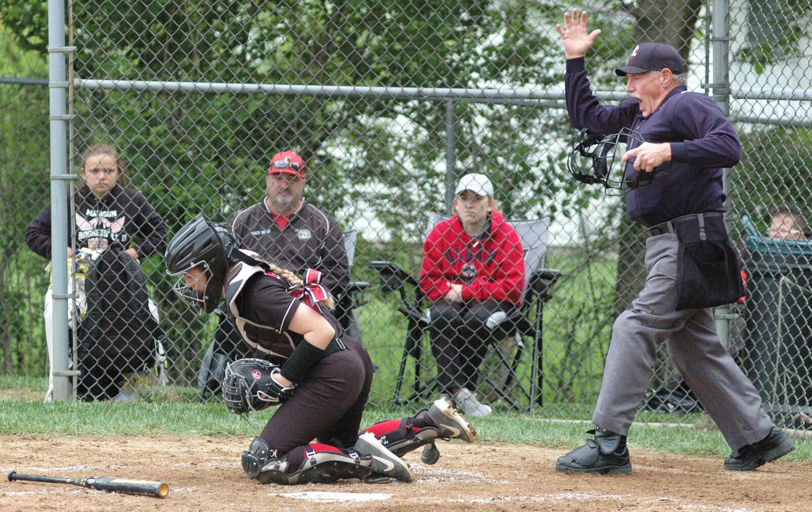 Madison catcher Caydance Crowe grabs a popup Monday during a Division III district softball semifinal against Deer Park at Wyoming. Deer Park won 6-3. RICK CASSANO/STAFF