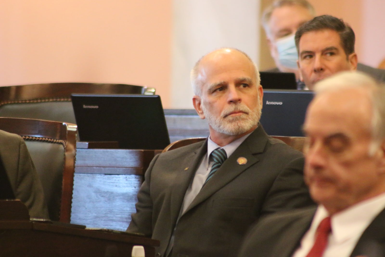 State Rep. Kyle Koehler, R-Springfield, generally wears a mask at the Statehouse but sometimes takes a break from it.