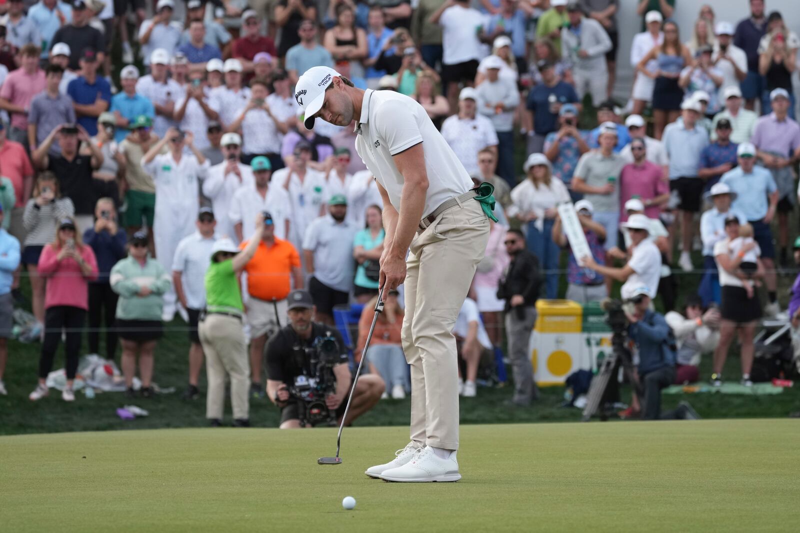 Thomas Detry, of Belgium, makes his birdie putt on the 18th hole to win the Phoenix Open golf tournament at TPC Scottsdale, Sunday, Feb. 9, 2025, in Scottsdale, Ariz. (AP Photo/Ross D. Franklin)