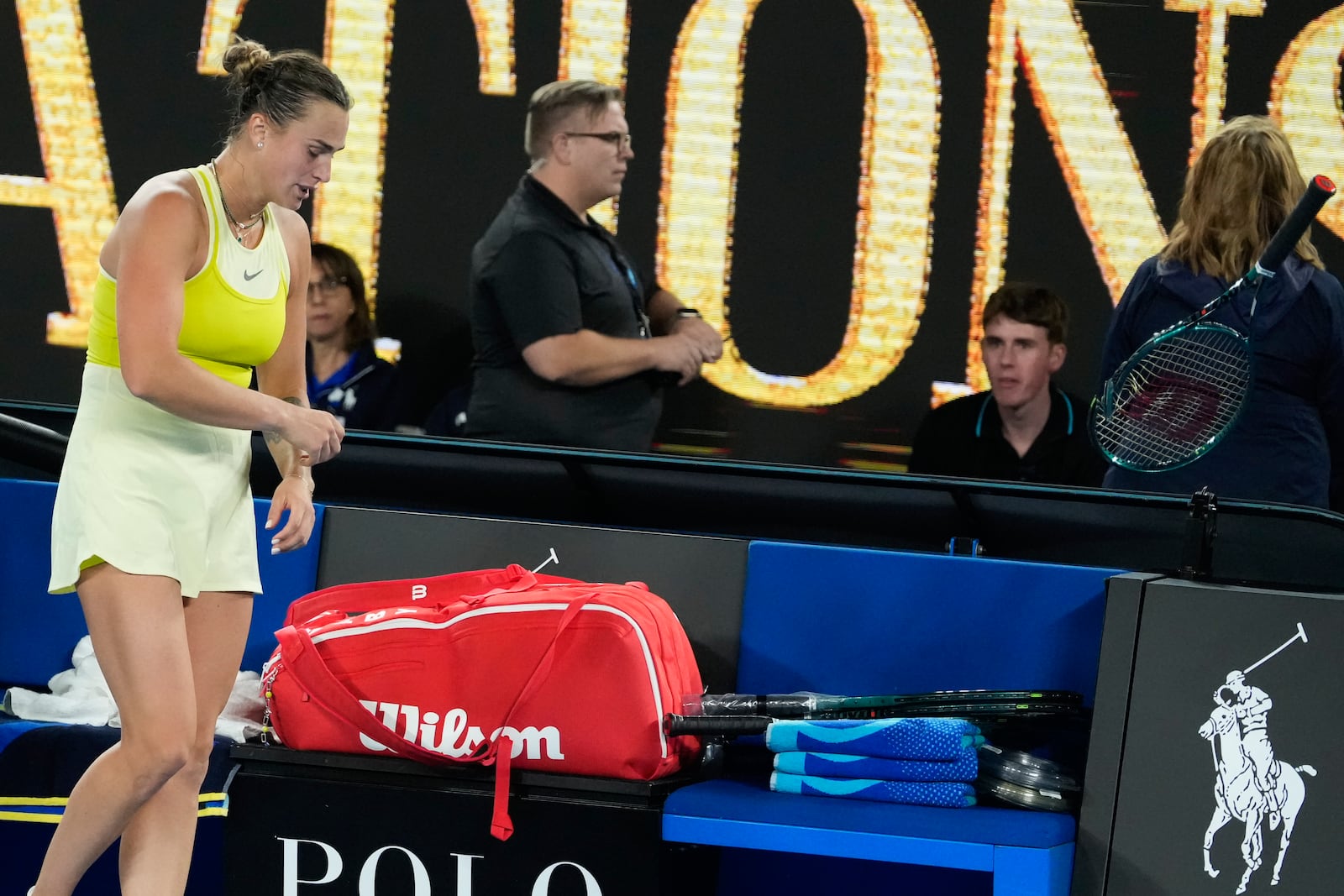 Aryna Sabalenka of Belarus throws her racker after losing the women's singles final against Madison Keys of the U.S. at the Australian Open tennis championship in Melbourne, Australia, Saturday, Jan. 25, 2025. (AP Photo/Asanka Brendon Ratnayake)