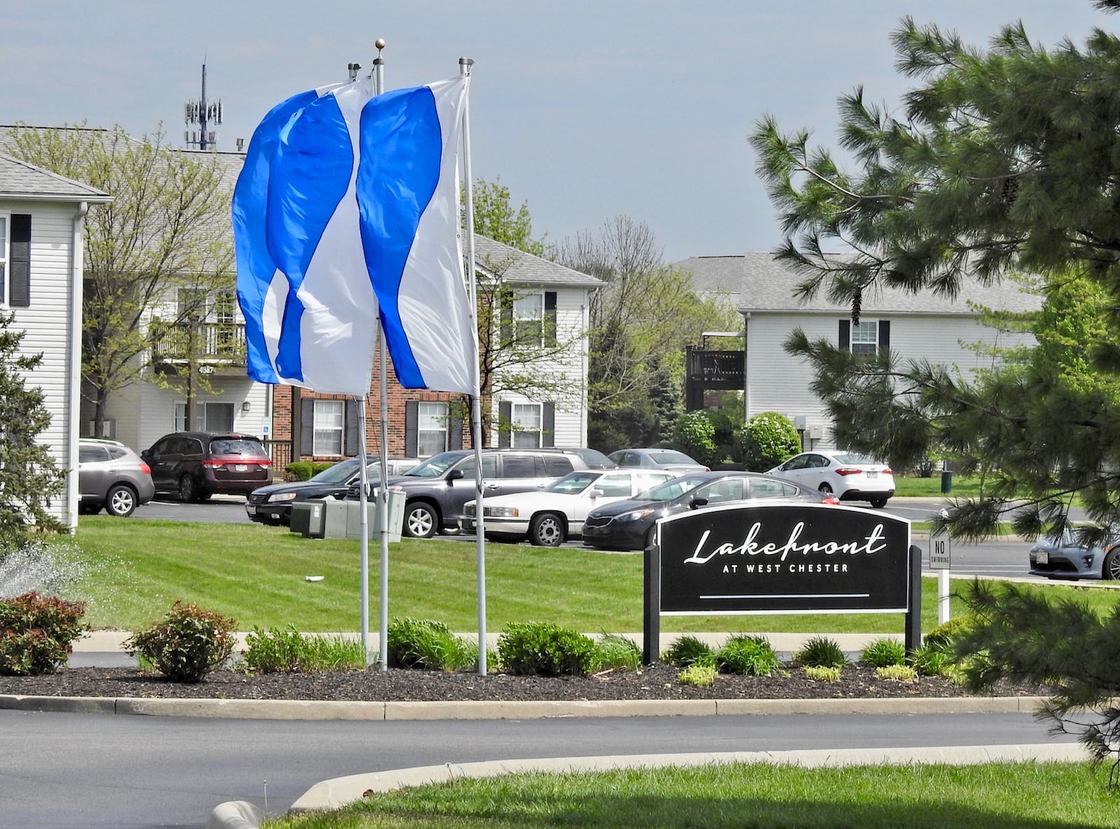 Crews searched a pond at the Lakefront at West Chester apartments on April 29, 2019, after the shooting deaths of four family members in an apartment there. NICK GRAHAM / STAFF