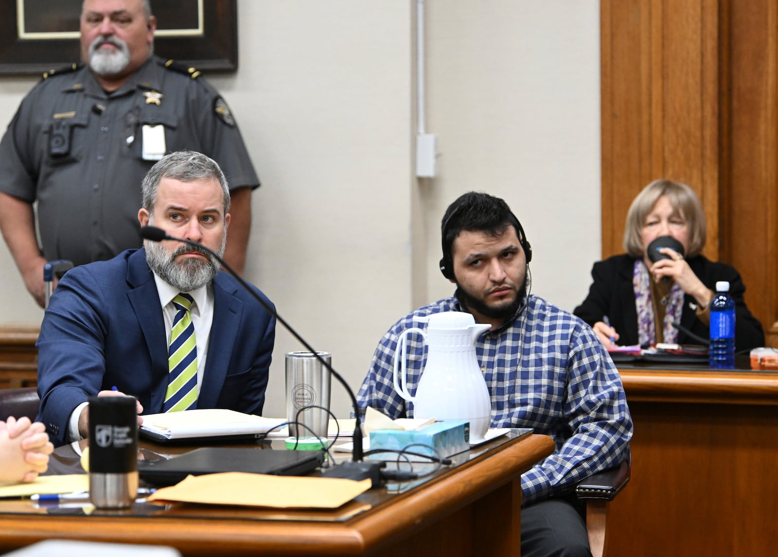 Jose Ibarra, accused of killing a Georgia nursing student earlier this year, listens through an interpreter as he sits with his attorney Dustin Kirby, left, during his trial at Athens-Clarke County Superior Court, Friday, Nov. 15, 2024, in Athens, Ga. (Hyosub Shin/Atlanta Journal-Constitution via AP, Pool)