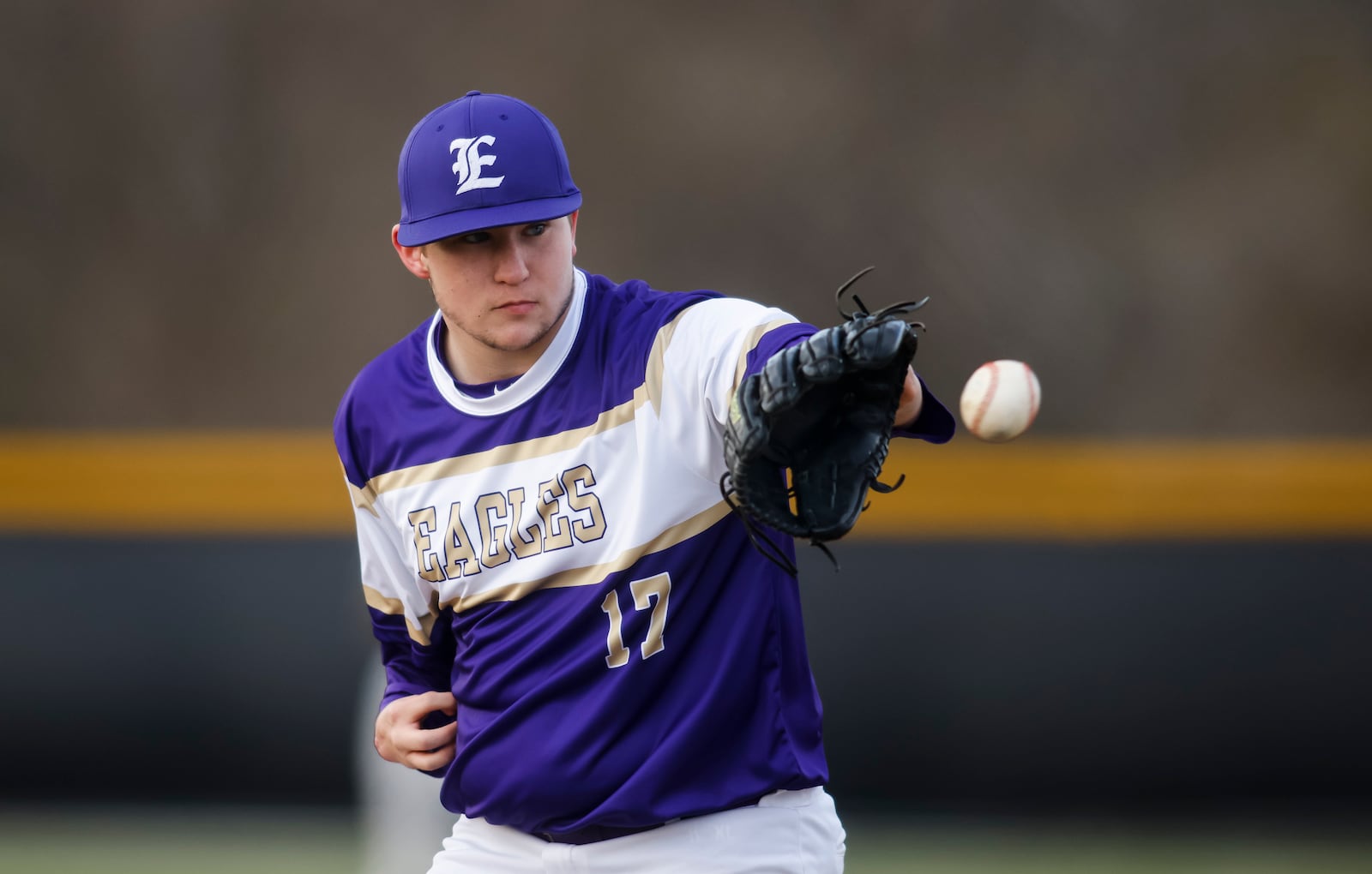 Eaton's Carson Brower pitches during their baseball game against Madison Wednesday, March 29, 2023 at Madison High School. Eaton won 13-1. Brower, who was born with a limb difference, pitches left handed then shifts his glove to his left hand to catch. Brower plans to play baseball at Bellarmine University after high school. NICK GRAHAM/STAFF