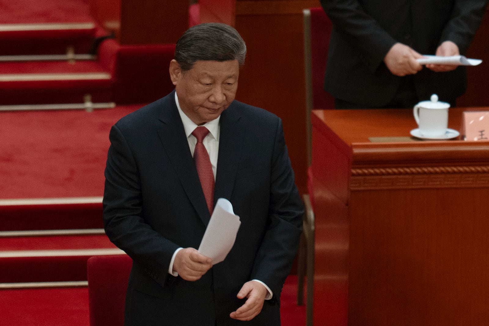 Chinese President Xi Jinping reacts after the closing ceremony of the Chinese People's Political Consultative Conference held at the Great Hall of the People in Beijing, Monday, March 10, 2025. (AP Photo/Ng Han Guan)