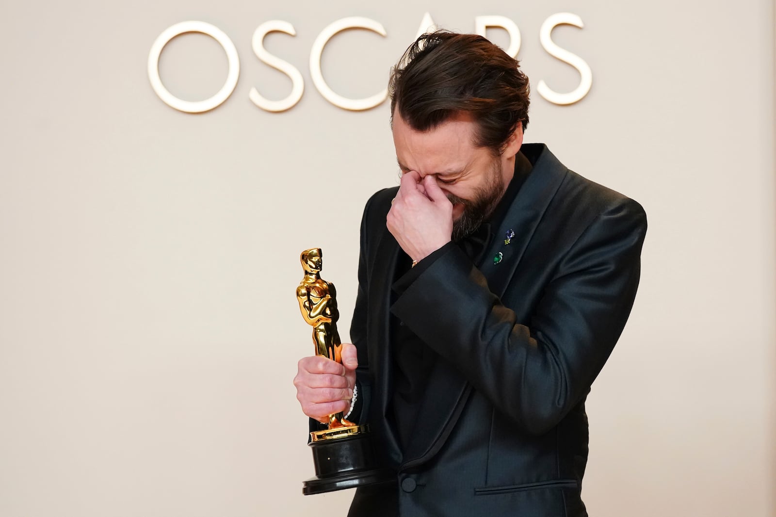 Kieran Culkin, winner of the award for best performance by an actor in a supporting role for "A Real Pain," poses in the press room at the Oscars on Sunday, March 2, 2025, at the Dolby Theatre in Los Angeles. (Photo by Jordan Strauss/Invision/AP)