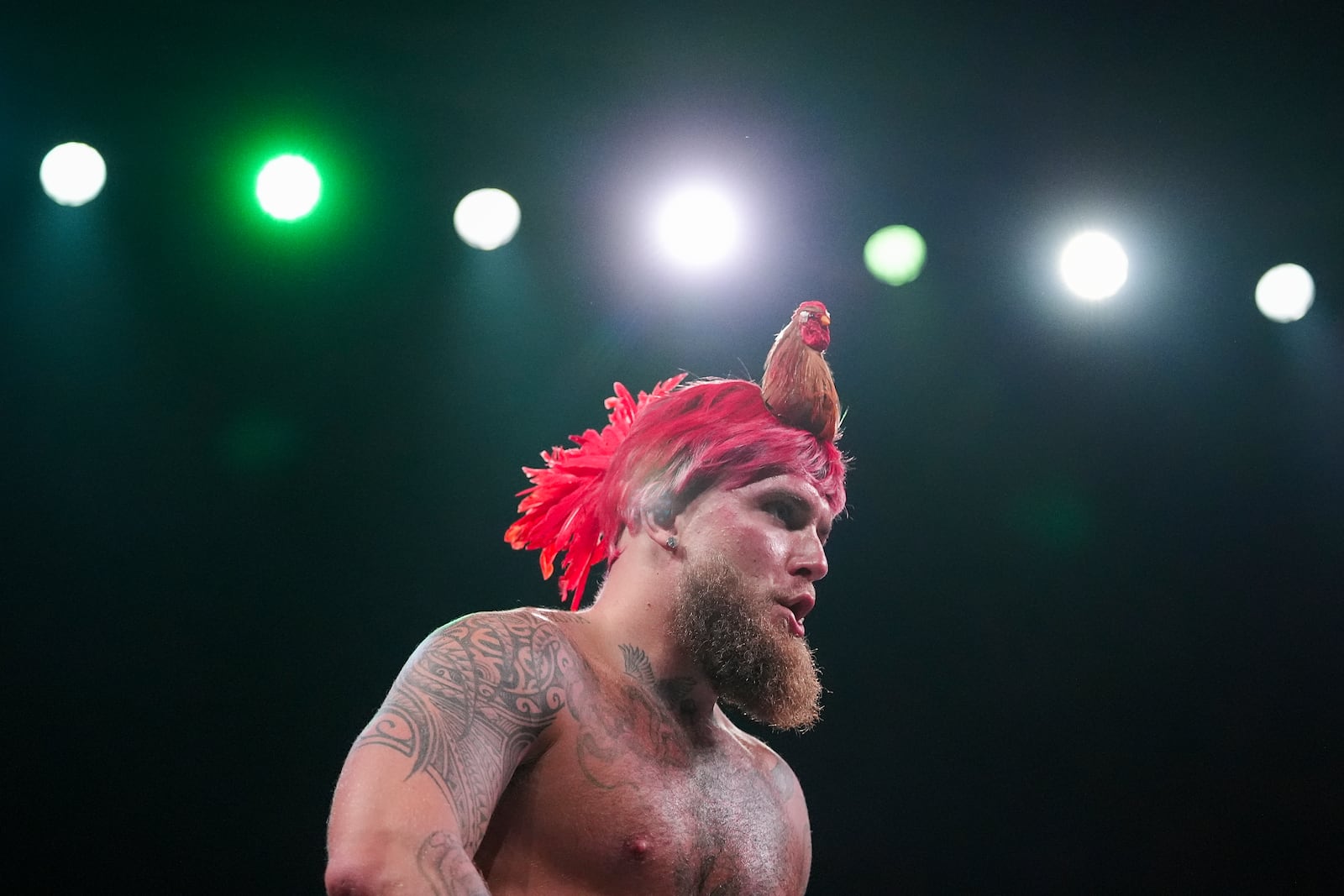 Jake Paul works out ahead of his boxing match against Mike Tyson, Tuesday, Nov. 12, 2024, in Irving, Texas. (AP Photo/Julio Cortez)