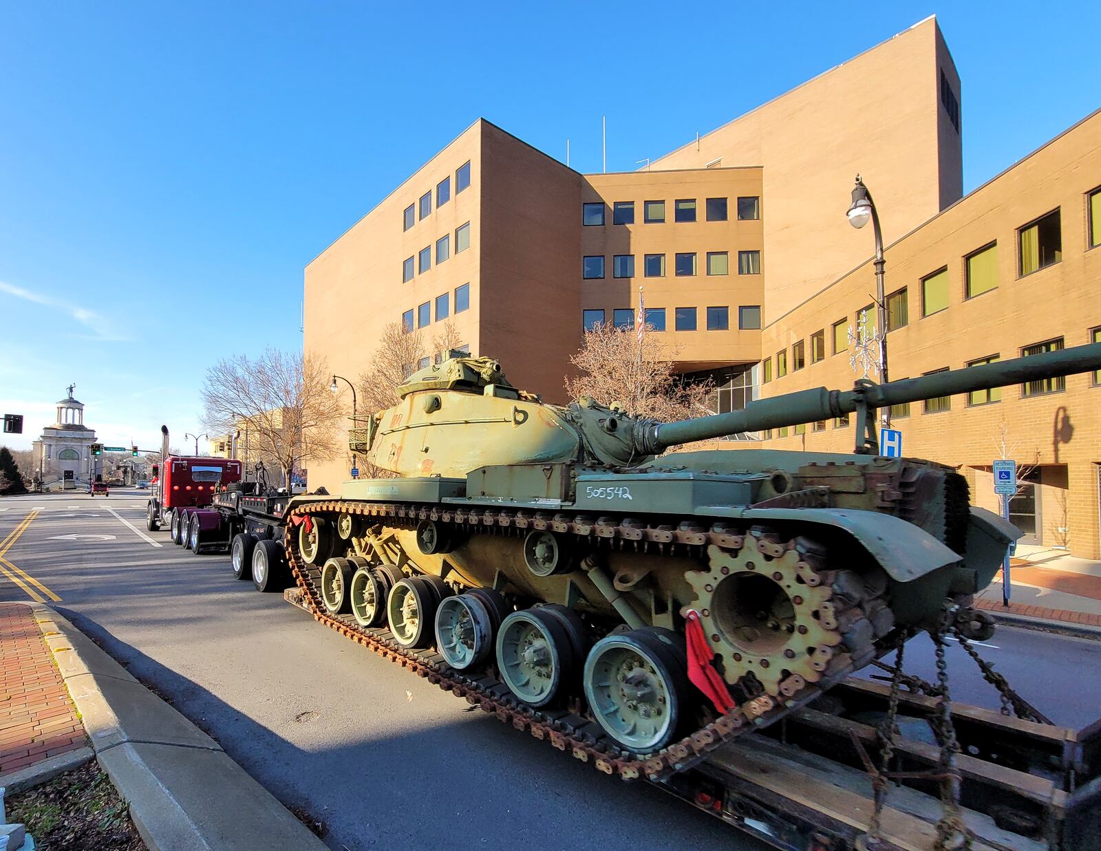 A military tank is carried on a trailer through downtown Hamilton Tuesday, Dec 14, 2021. NICK GRAHAM / STAFF