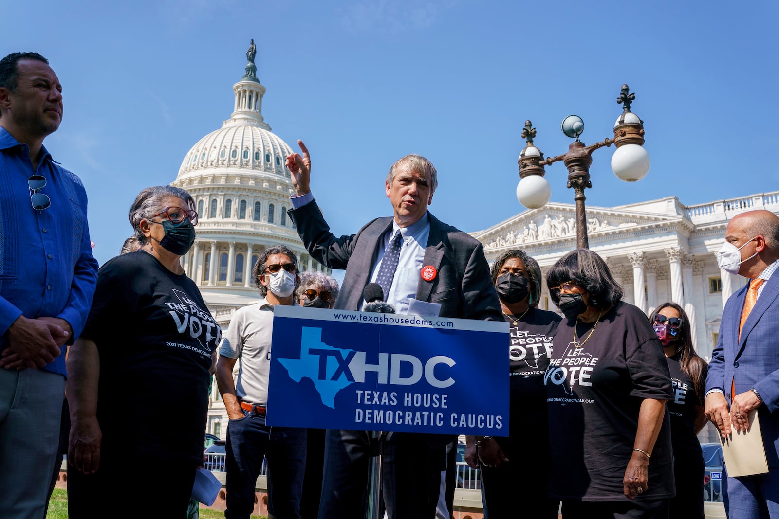 FILE - Sen. Jeff Merkley, D-Ore., joins members of the Texas House Democratic Caucus as he speaks to reporters about their fight against restrictive voting laws, at the Capitol in Washington, Aug. 6, 2021. The Texas Democrats left the state in protest to prevent Republicans from changing the state's elections laws. (AP Photo/J. Scott Applewhite, File)