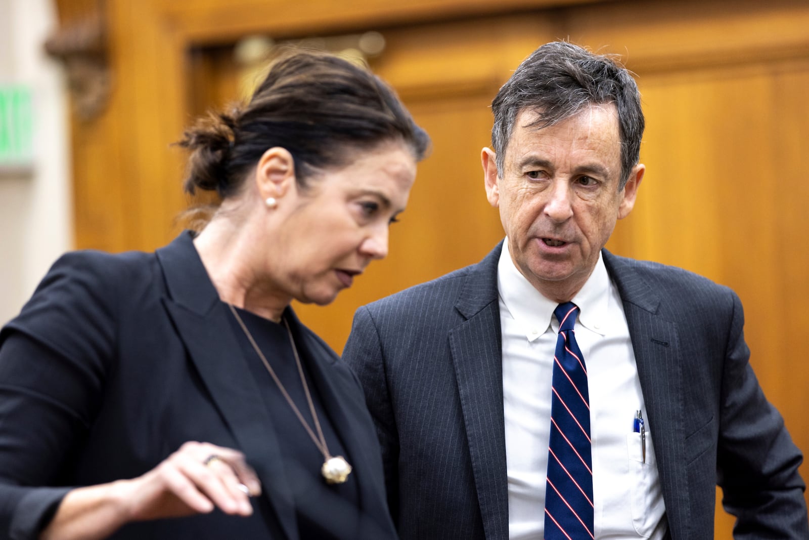 Prosecutor Sheila Ross and defense attorney John Donnelly confer during Jose Ibarra's trial at the Athens-Clarke County Superior Court, Tuesday, Nov. 19, 2024, in Athens, Ga. (Arvin Temkar/Atlanta Journal-Constitution via AP, Pool)