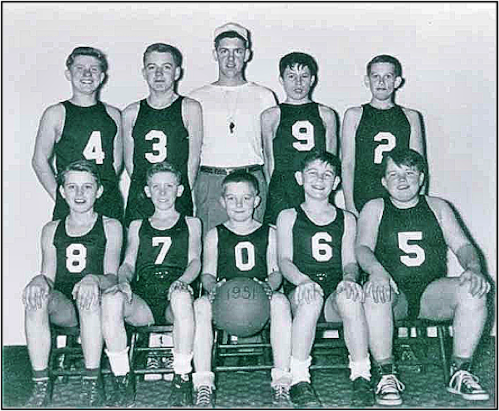 The Purple Skunks youth basketball team that Dale Bufler, then a student at Miami University , started for the kids in Darrtown where he grew up. There was also a Skunks baseball team.  The kids raised money for their uniforms by collecting newspapers and scrap metal. They bought purple shirts and Dale’s  Aunt Addie sewed numerals on them. The team played area schools. Pictured here: (standing left to right): Jerry Quick, Roger Wiley, Coach Dale Bufler, Junior Collins, and Bob Young. (Seated left to right: Paul Jewell, Bob Quick, Ronnie Wiley, Kirk Mee III, and Jimmy Stevens. CONTRIBUTED