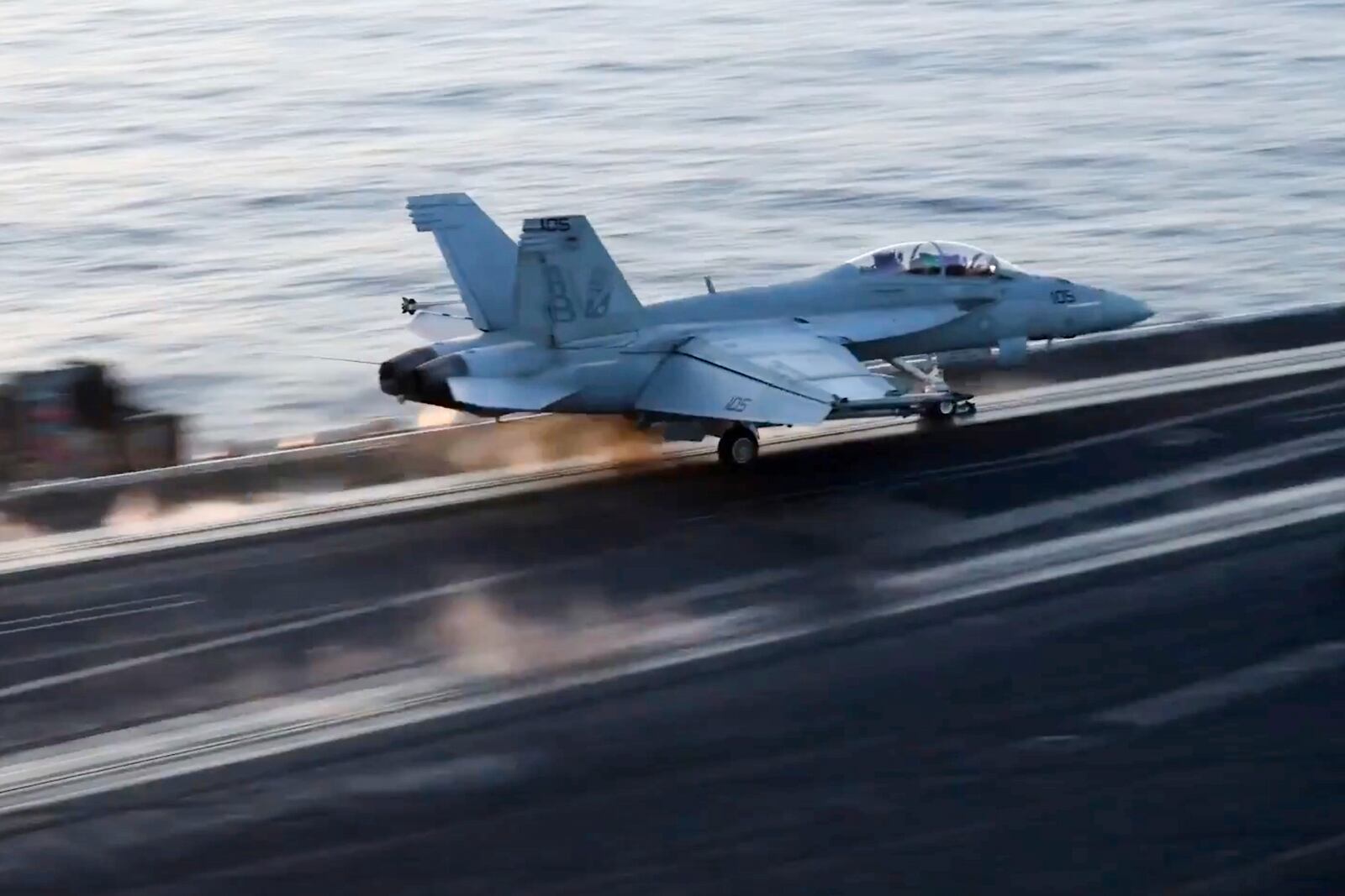 This image taken from video provided by the U.S. Navy shows an aircraft launching from a carrier in an undisclosed location before airstrikes in Sanaa, Yemen, Saturday, March 15, 2025. (U.S. Navy via AP)