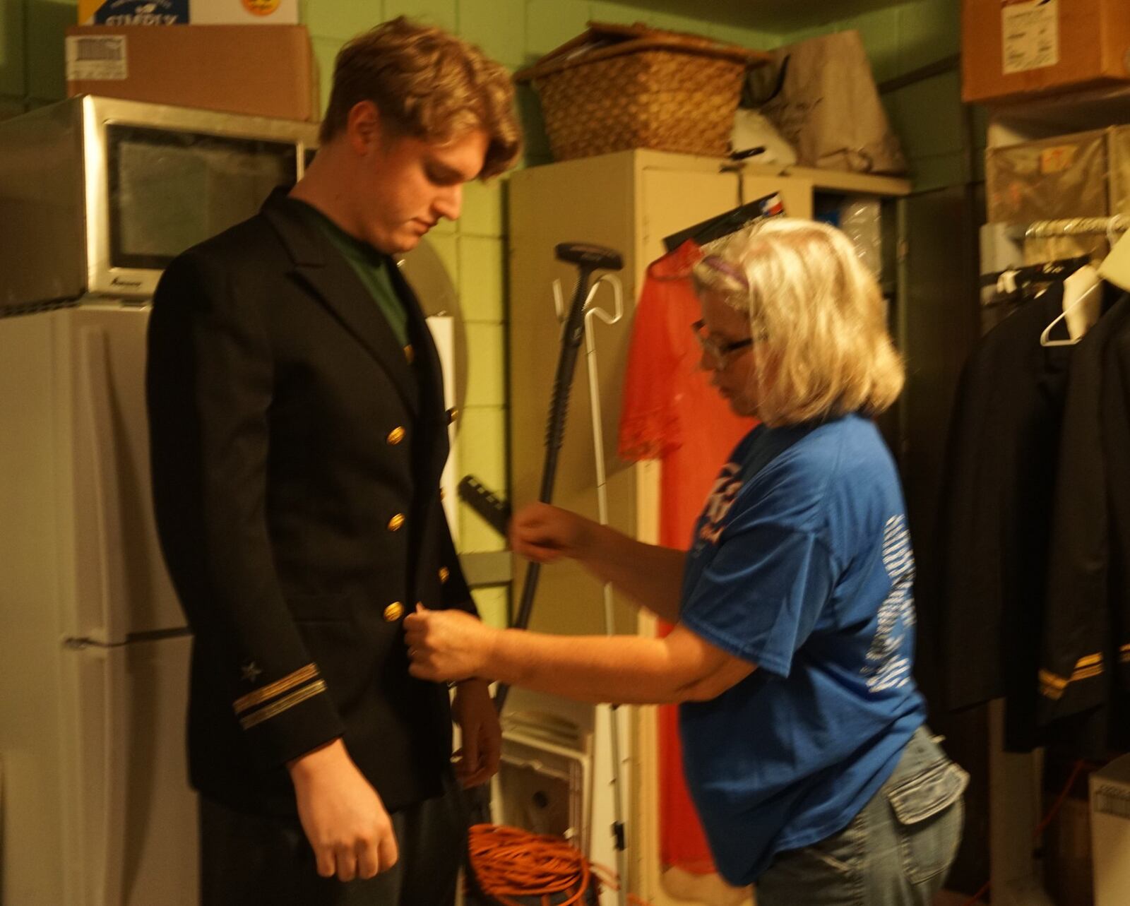 More than 150 volunteers work on FutureFest. Here, costume designer Theresa Kahle fits costumes for the upcoming play, “On the Horizon.” CONTRIBUTED