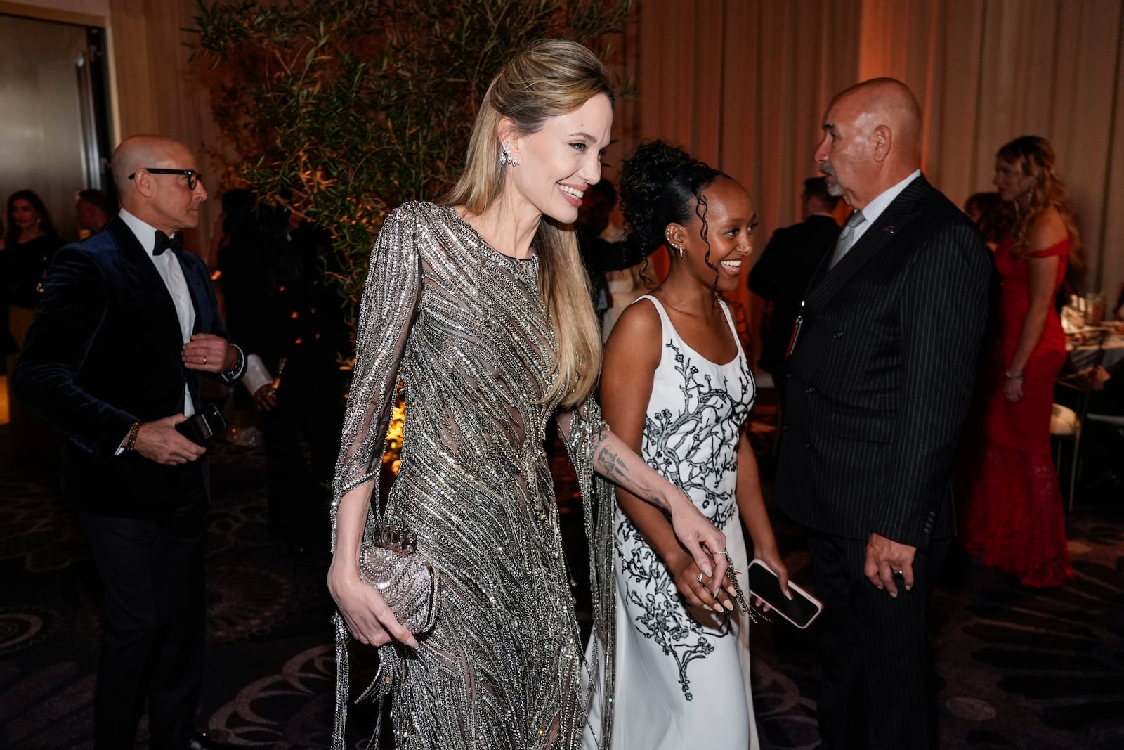 Angelina Jolie, left, and Zahara Marley Jolie arrive at the 82nd Golden Globes on Sunday, Jan. 5, 2025, at the Beverly Hilton in Beverly Hills, Calif. (AP Photo/Chris Pizzello)