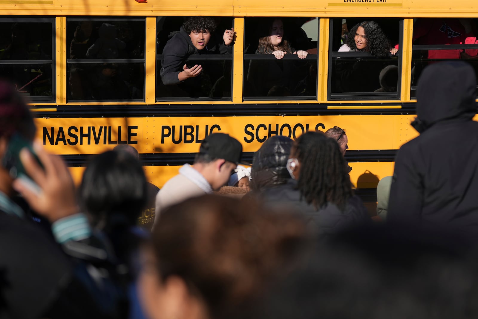 Students wait to get off a bus at a unification site following a shooting at the Antioch High School in Nashville, Tenn., Wednesday, Jan. 22, 2025. (AP Photo/George Walker IV)