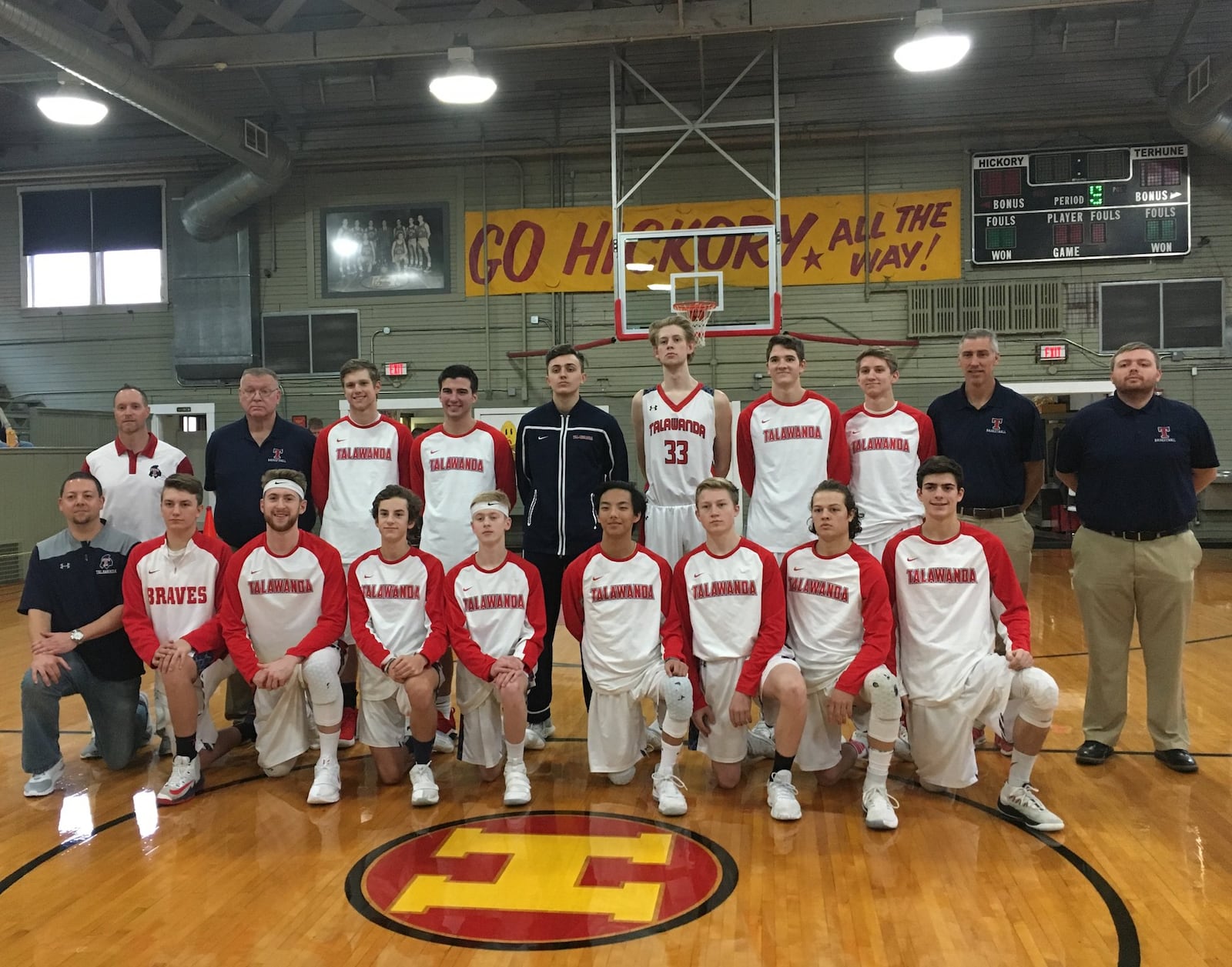 The Talawanda Braves pose for a photo before Saturday afternoon’s game against Franklin County (Ind.) at the Hoosier Gym in Knightstown, Ind. RICK CASSANO/STAFF