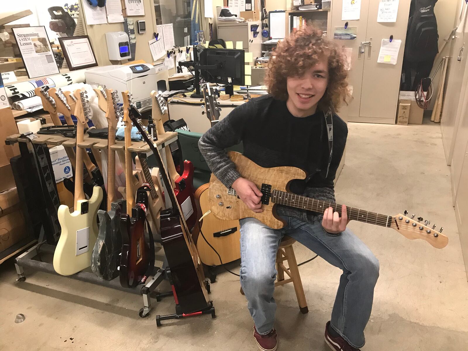 Sinclair Community College's STEM Guitar Project started in 2008. Student worker Blake Kinderdine is pictured.