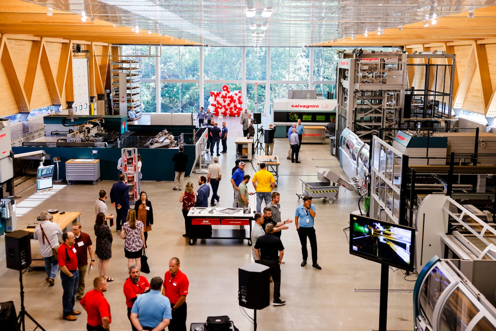 Salvagnini America held a ribbon cutting and hosted a demo day of their new expansion Thursday, June 23, 2022 in Hamilton. Salvagnini produces a variety of machines for punching, bending, laser cutting, material handling, sorting and more for the manufacturing industry. NICK GRAHAM/STAFF