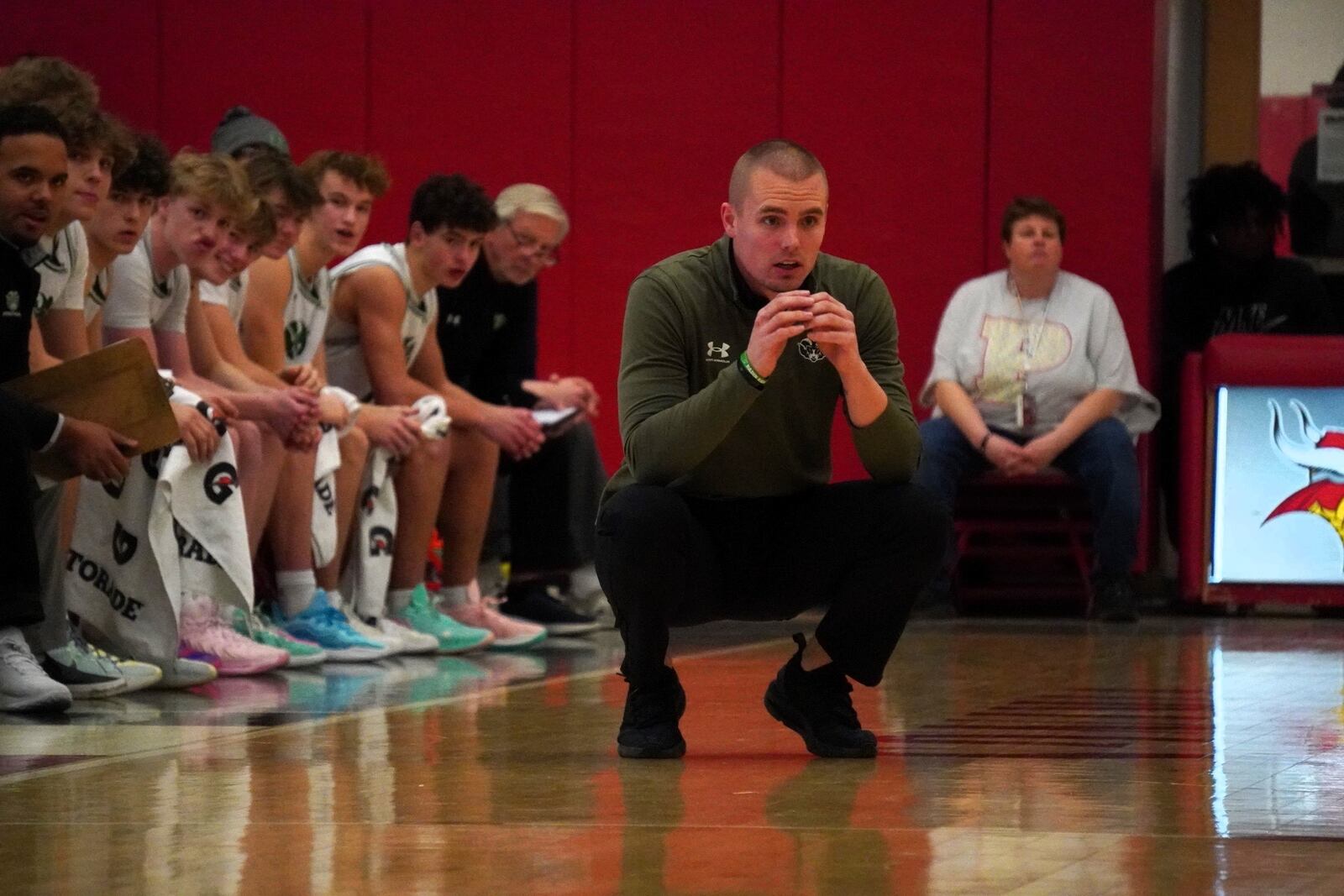 Badin coach CJ Fleming watches on during the Rams' tournament game against Woodward on Friday night at Princeton. Chris Vogt/CONTRIBUTED