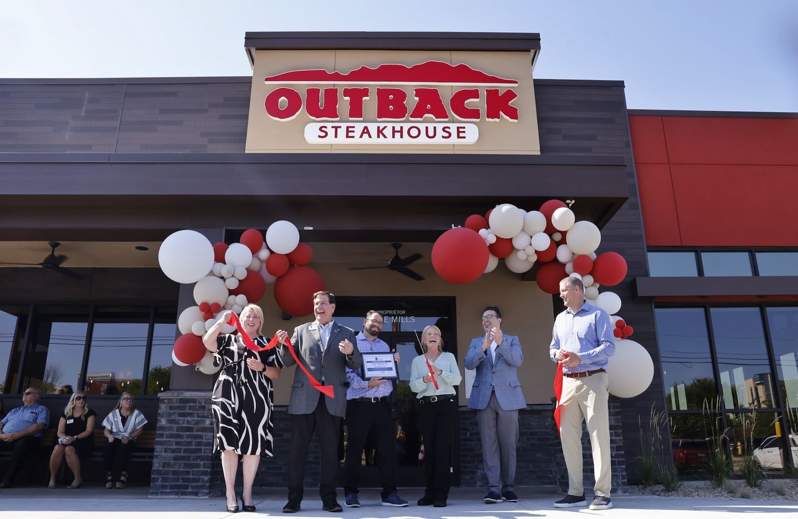 A ribbon cutting was held Wednesday, Aug. 14, 2024 for the new Outback Steakhouse at 7530 Foster Lane in West Chester Township. The restaurant is across Liberty Way from Liberty Center. NICK GRAHAM/STAFF