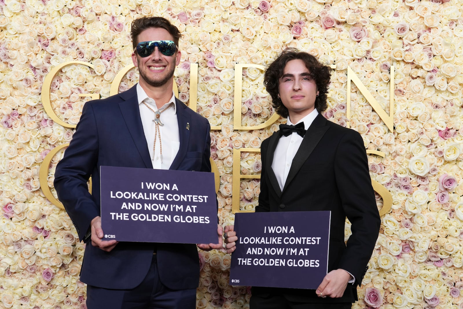 Max Braunstein, left, and Miles Mitchell arrive at the 82nd Golden Globes on Sunday, Jan. 5, 2025, at the Beverly Hilton in Beverly Hills, Calif. (Photo by Jordan Strauss/Invision/AP)