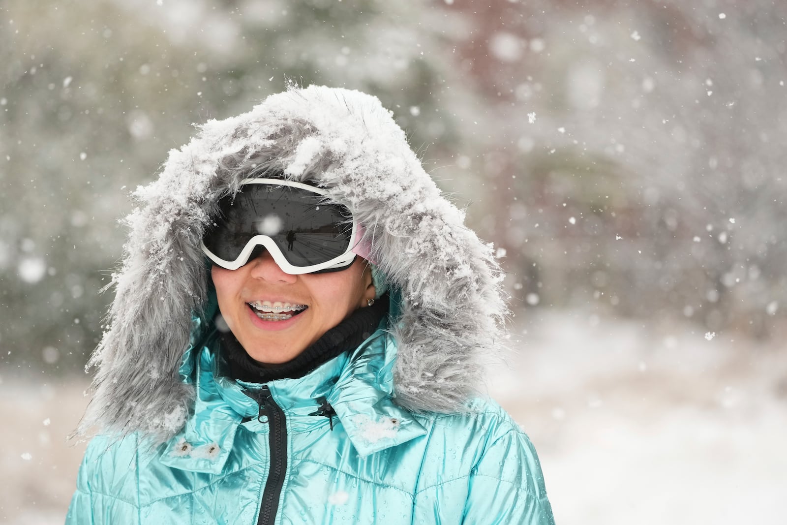 Ky McCray walks in the snow Friday, Jan 10, 2025, in Nashville, Tenn. (AP Photo/George Walker IV)