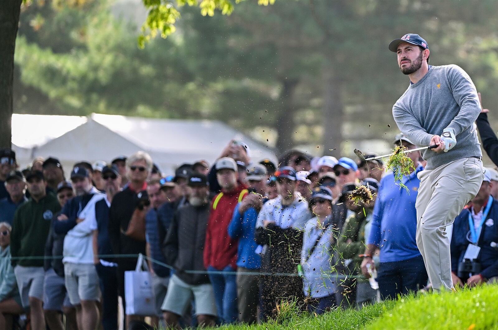 United States team member Patrick Cantlay plays a shot on the sixth hole during the third round at the Presidents Cup golf tournament at Royal Montreal Golf Club in Montreal Saturday, Sept. 28, 2024. (Graham Hughes/The Canadian Press via AP)