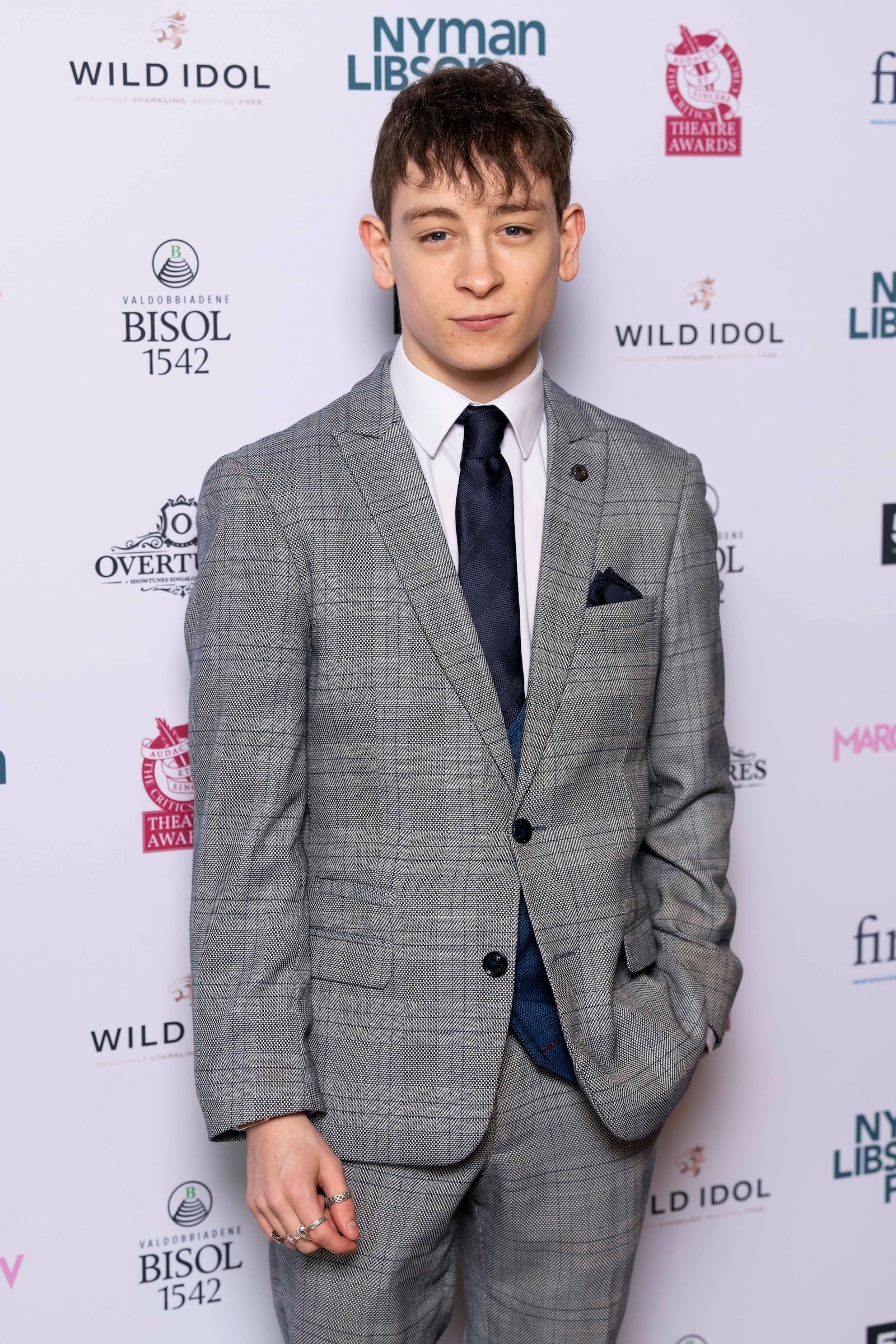 FILE - Louis McCartney poses for photographers on arrival at the Critics' Circle Theatre Awards in central London, on Monday, March 25, 2024. McCartney will star in the stage play "Stranger Things: The First Shadow" on Broadway. (Scott A Garfitt/Invision/AP, File)