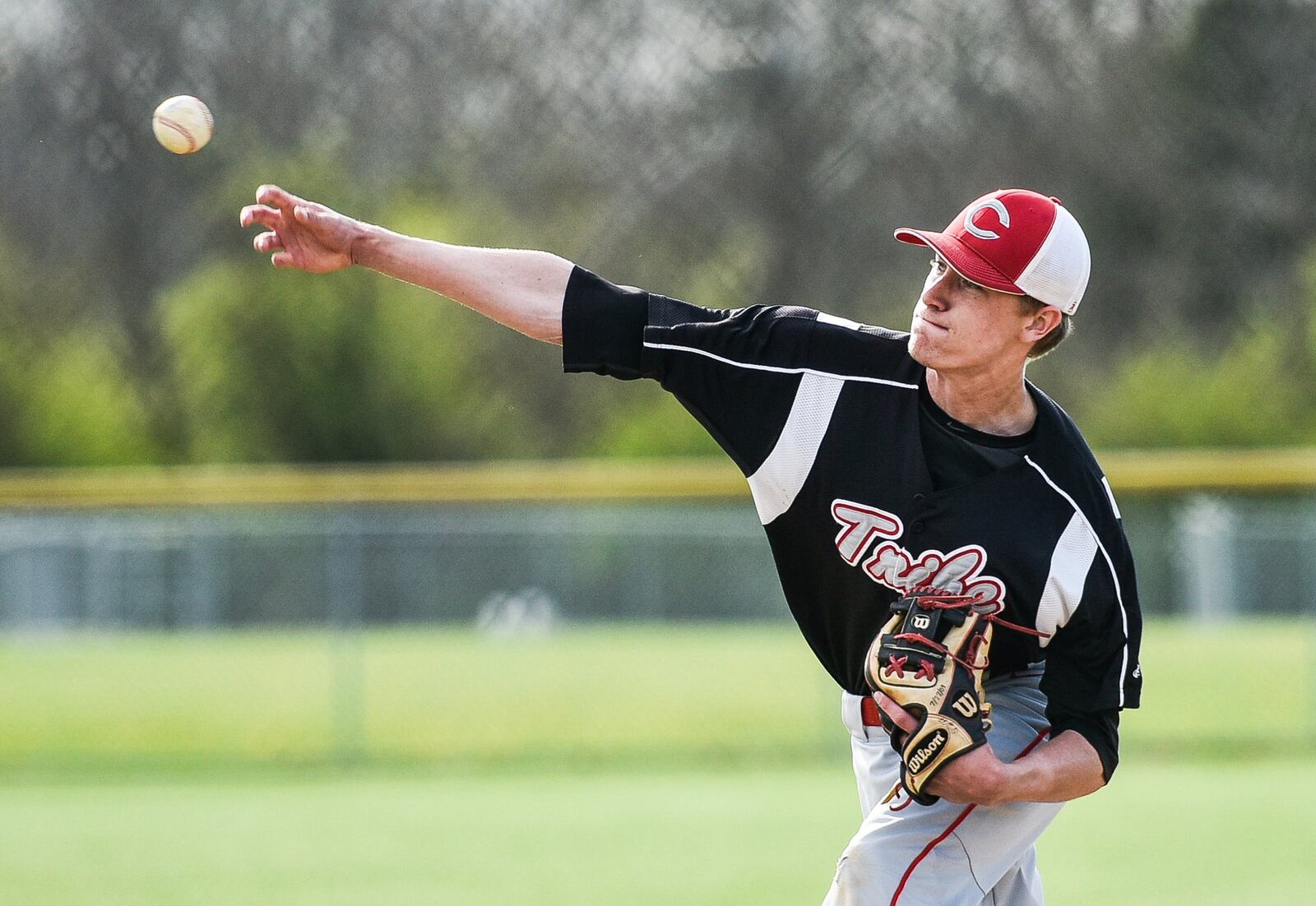 Carlisle’s Brandon Saylor delivers a pitch during Thursday’s game at Madison. NICK GRAHAM/STAFF