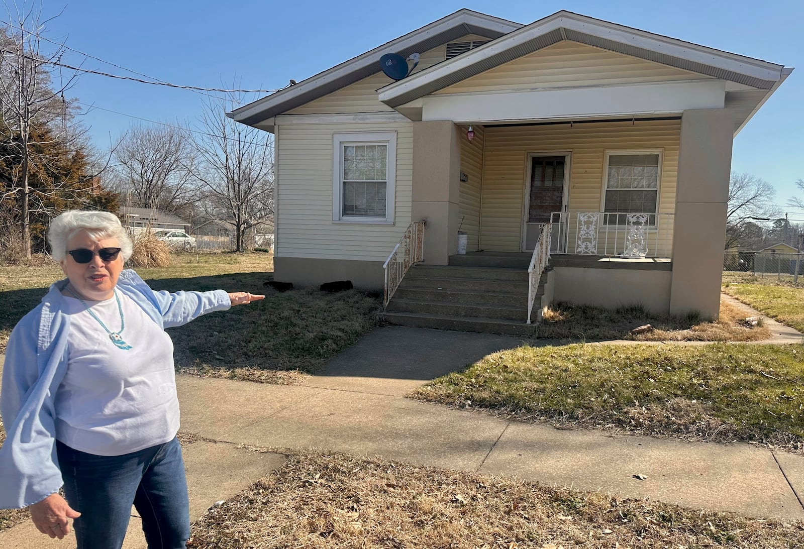 Sylvia Carvell describes her mother's childhood home in Murphysboro that was rebuilt to match the one destroyed in the March 18, 1925 Tri-State Tornado on March 11, 2025 in Murphysboro, Ill. (AP Photo/John O'Connor)