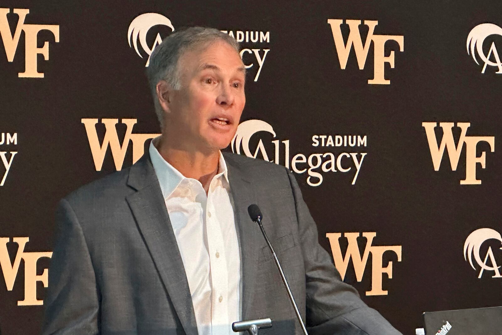 Dave Clawson explaining his decision to resign as head football coach at Wake Forest, Tuesday, Dec. 17, 2024, during an during an NCAA college football news conference in Winston=Salem, N.C. (AP Photo/Aaron Beard)