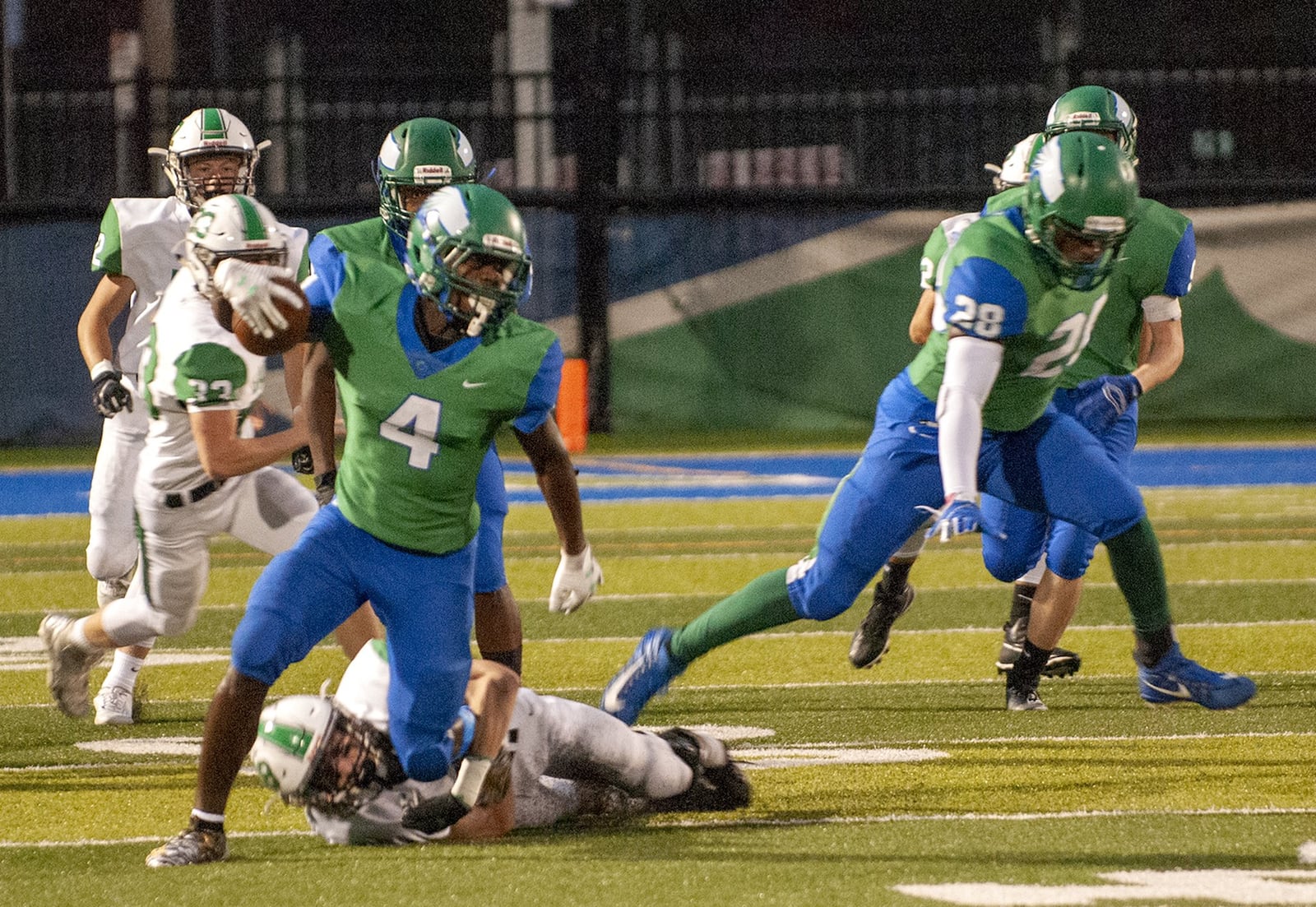 Chaminade Julienne receiver Kenyon Owens breaks a tackle against Hamilton Badin. Jeff Gilbert/CONTRIUBUTED