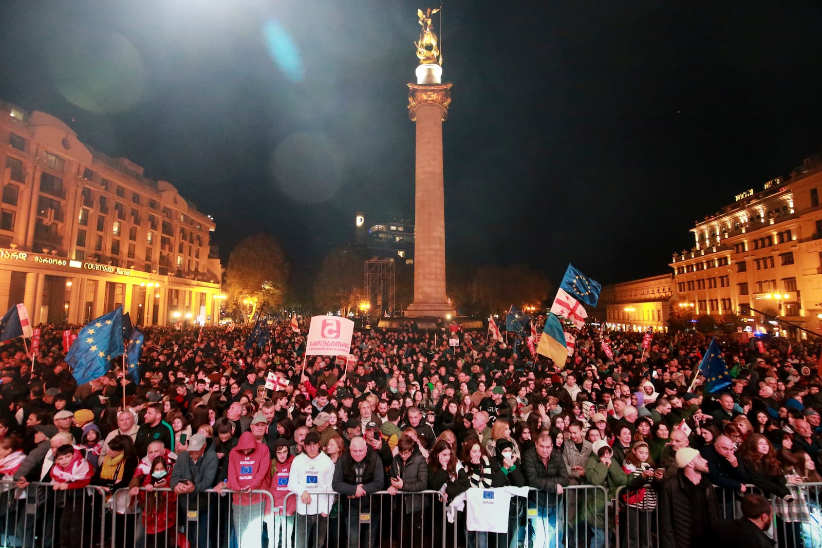 Demonstrators attend an opposition rally ahead upcoming next week parliamentary election in Tbilisi, Georgia, Sunday, Oct. 20, 2024. (AP Photo/Zurab Tsertsvadze)