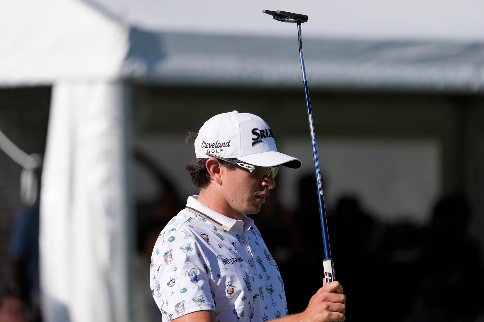 Nico Echavarria, of Columbia, reacts after missing a shot on the 18th green during a playoff in the final round of the Sony Open golf event, Sunday, Jan. 12, 2025, at Waialae Country Club in Honolulu. (AP Photo/Matt York)