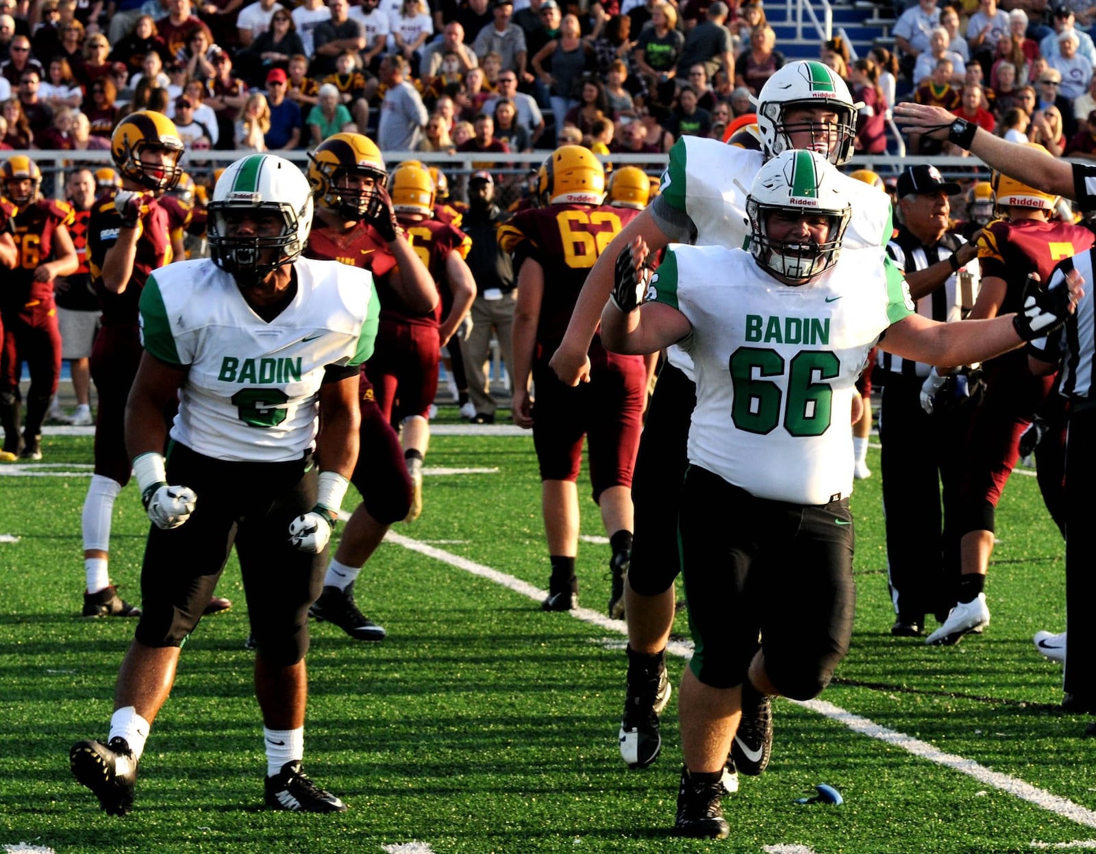 Badin’s Lavassa Martin (6) and Chase Luckett (66) celebrate a fumble recovery during Friday night’s 36-6 triumph over Ross in the Skyline Chili Crosstown Showdown at Hamilton’s Virgil Schwarm Stadium. CONTRIBUTED PHOTO BY DAVID A. MOODIE