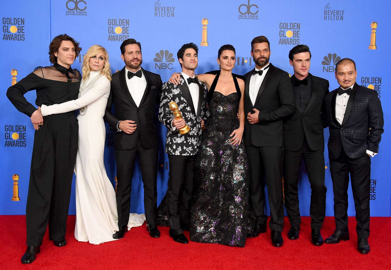 The cast of "The Assassination of Gianni Versace: American Crime Story" poses in the press room with the award for best television limited series or motion picture made for television at the 76th annual Golden Globe Awards at the Beverly Hilton Hotel on Sunday, Jan. 6, 2019, in Beverly Hills, Calif. Pictured from left are Cody Fern, Judith Light, Edgar Ramirez, Darren Criss, Penelope Cruz, Ricky Martin, Finn Wittrock and Jon Jon Briones.