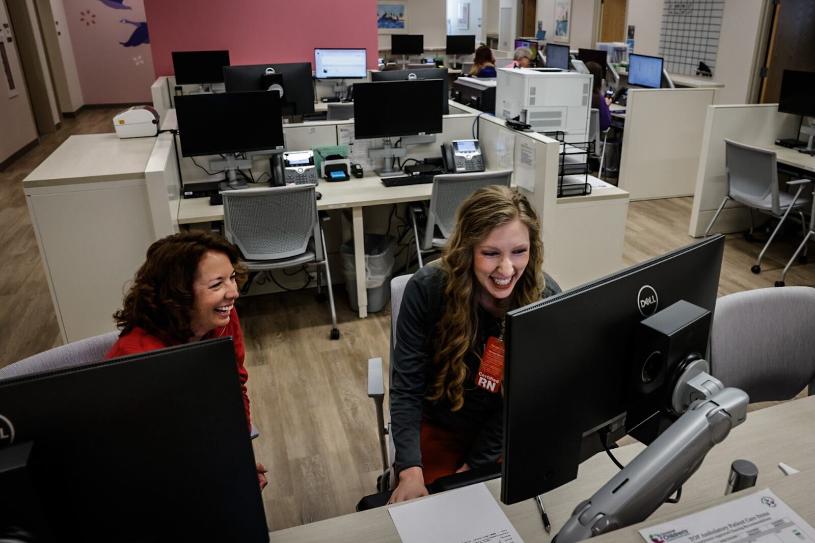 Cincinnati Children's nurses Kelly Wenning, left, and Sarah Morgan are part of the team at Cincinnati Children's renovated building on Clyo Road in Centerville. JIM NOELKER/STAFF