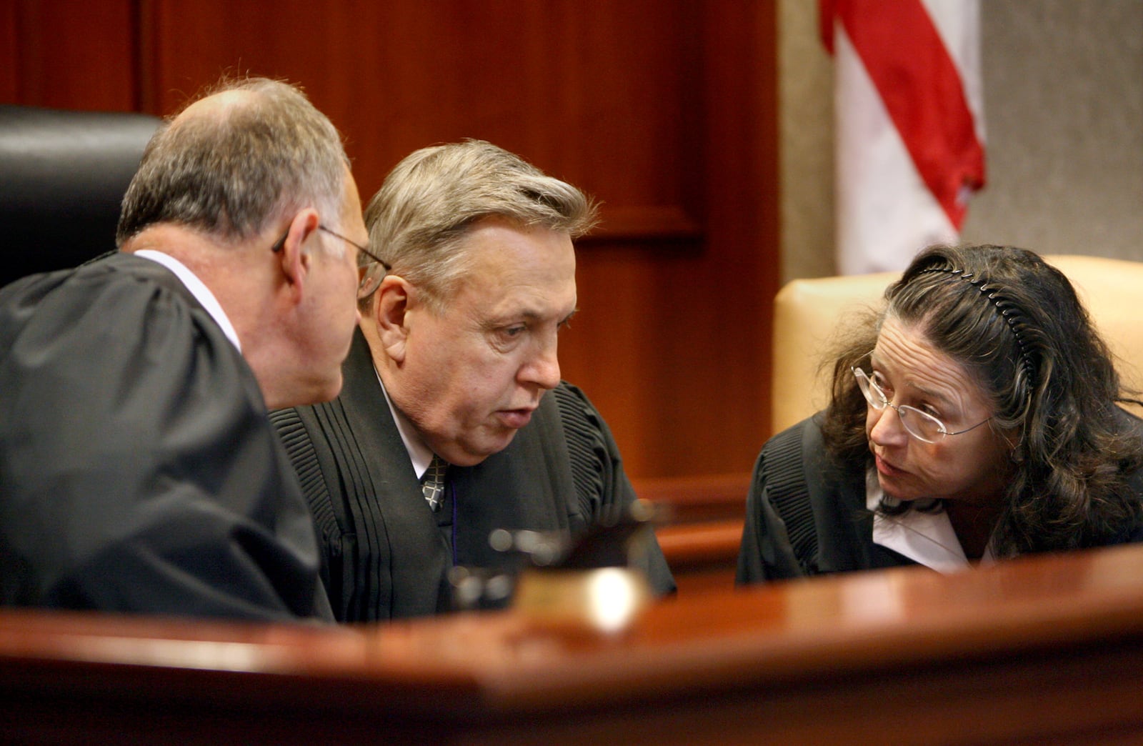 A three judge panel comprised of Judges Charles Pater, Noah Powers, and Patricia Oney have a conference before opening statements in the death penalty murder trial of Greg Osie, Monday, Apr. 19, 2010. Staff photo by Greg Lynch