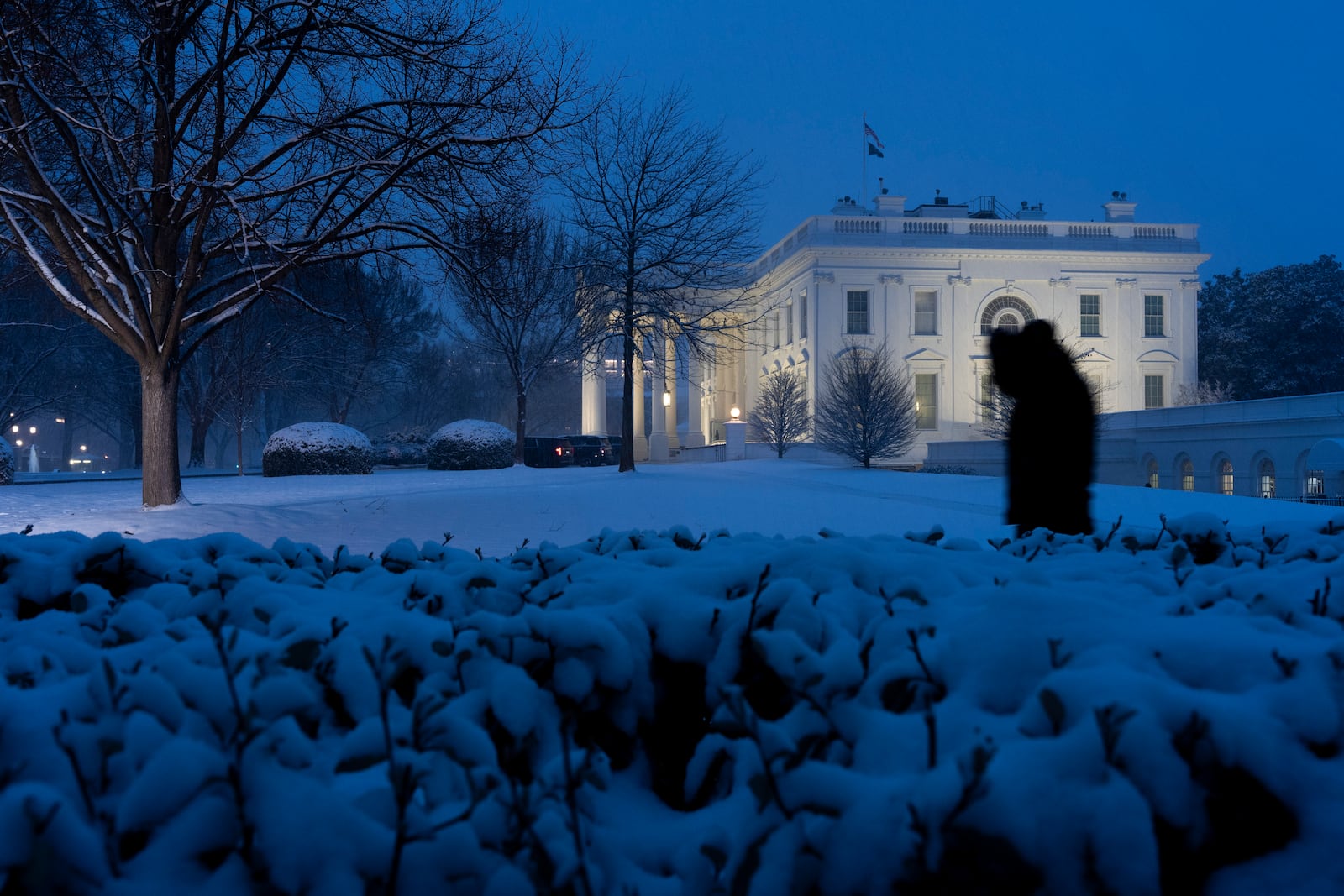 The White House is seen as the snow falls, Tuesday, Feb. 11, 2025, in Washington. (Photo/Alex Brandon)