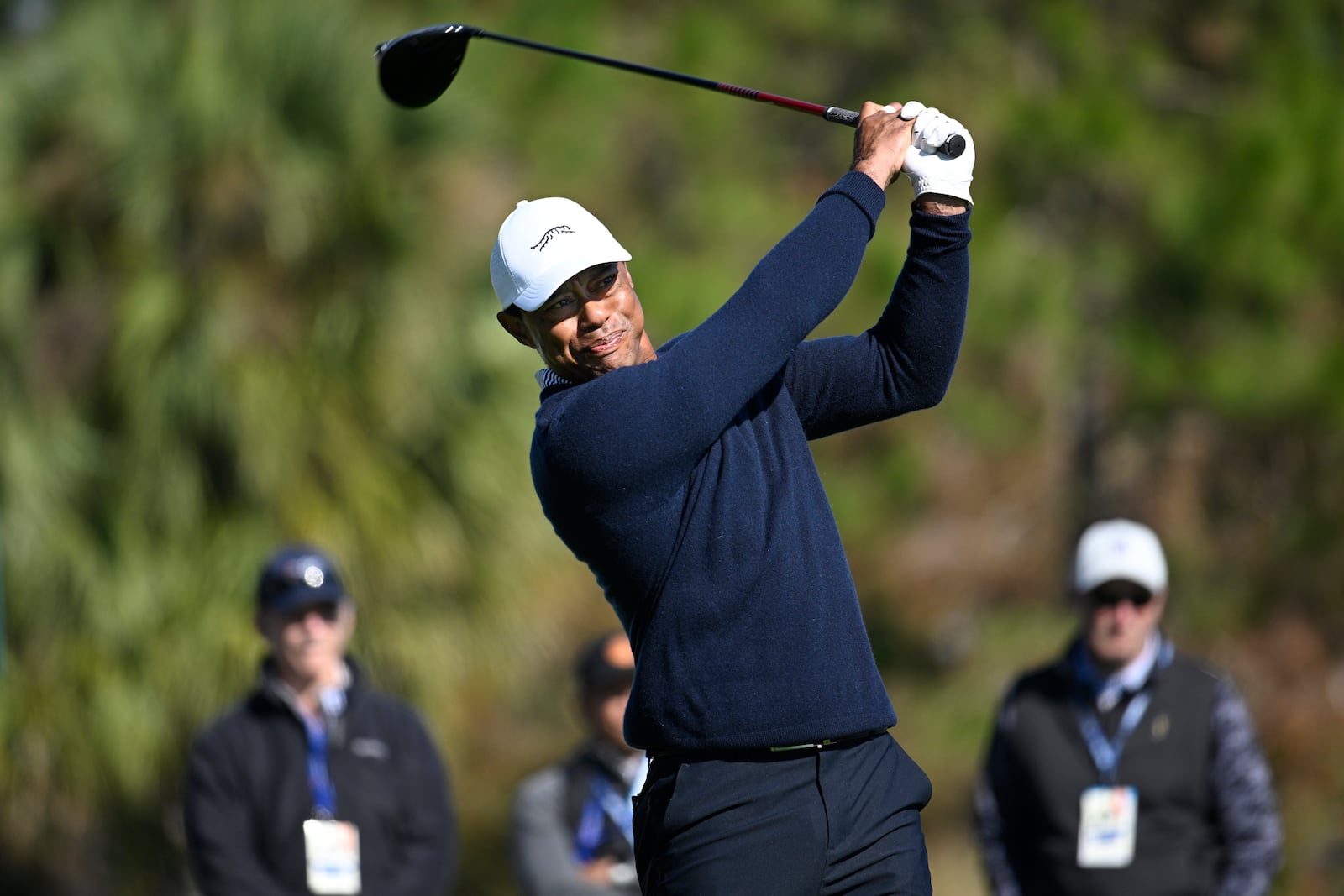 Tiger Woods tees off on the fifth hole during the first round of the PNC Championship golf tournament, Saturday, Dec. 21, 2024 in Orlando. (AP Photo/Phelan M. Ebenhack)