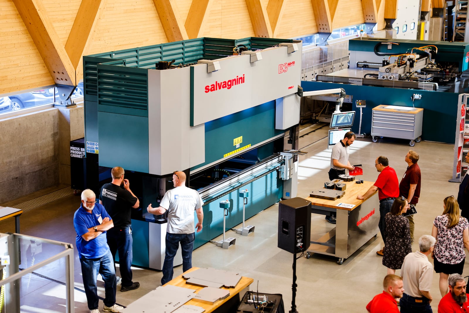 Salvagnini America held a ribbon cutting and hosted a demo day of their new expansion Thursday, June 23, 2022 in Hamilton. Salvagnini produces a variety of machines for punching, bending, laser cutting, material handling, sorting and more for the manufacturing industry. NICK GRAHAM/STAFF