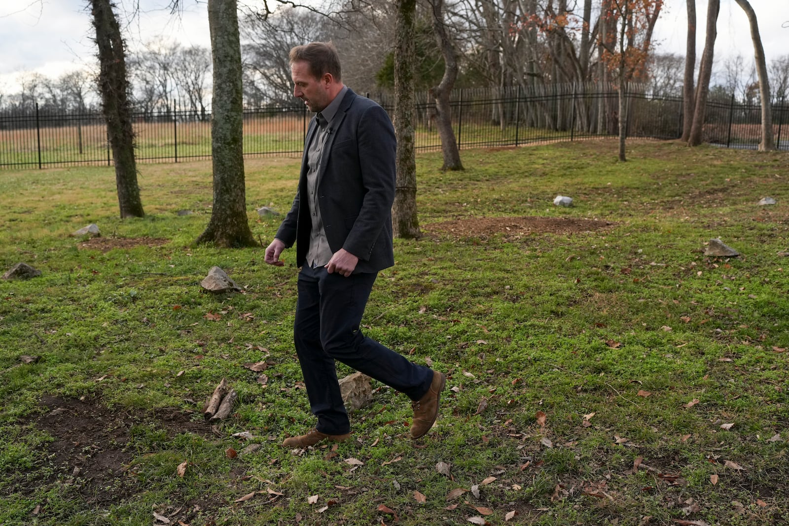 Archaeologist James Greene walks through a slave cemetery Monday, Dec. 9, 2024, in Nashville, Tenn. The site was discovered at The Hermitage, the home of former President Andrew Jackson. (AP Photo/George Walker IV)