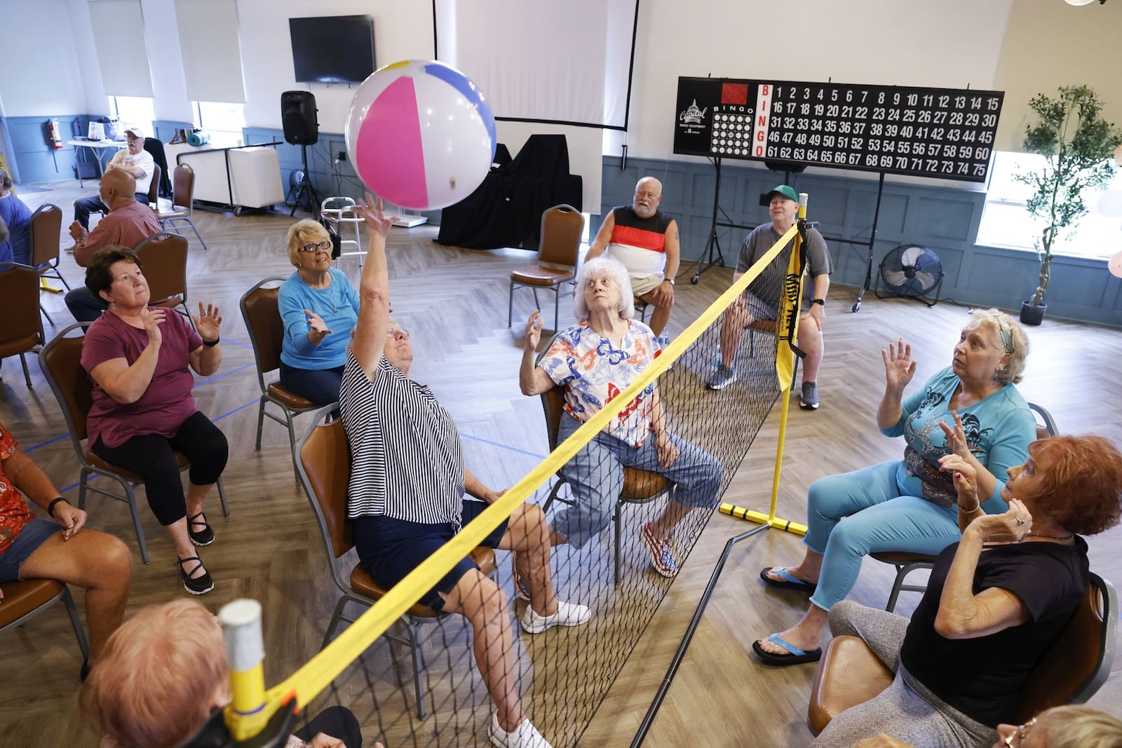 A group plays chair volleyball at Central Connections Monday, Aug. 7, 2023 in Middletown. NICK GRAHAM/STAFF