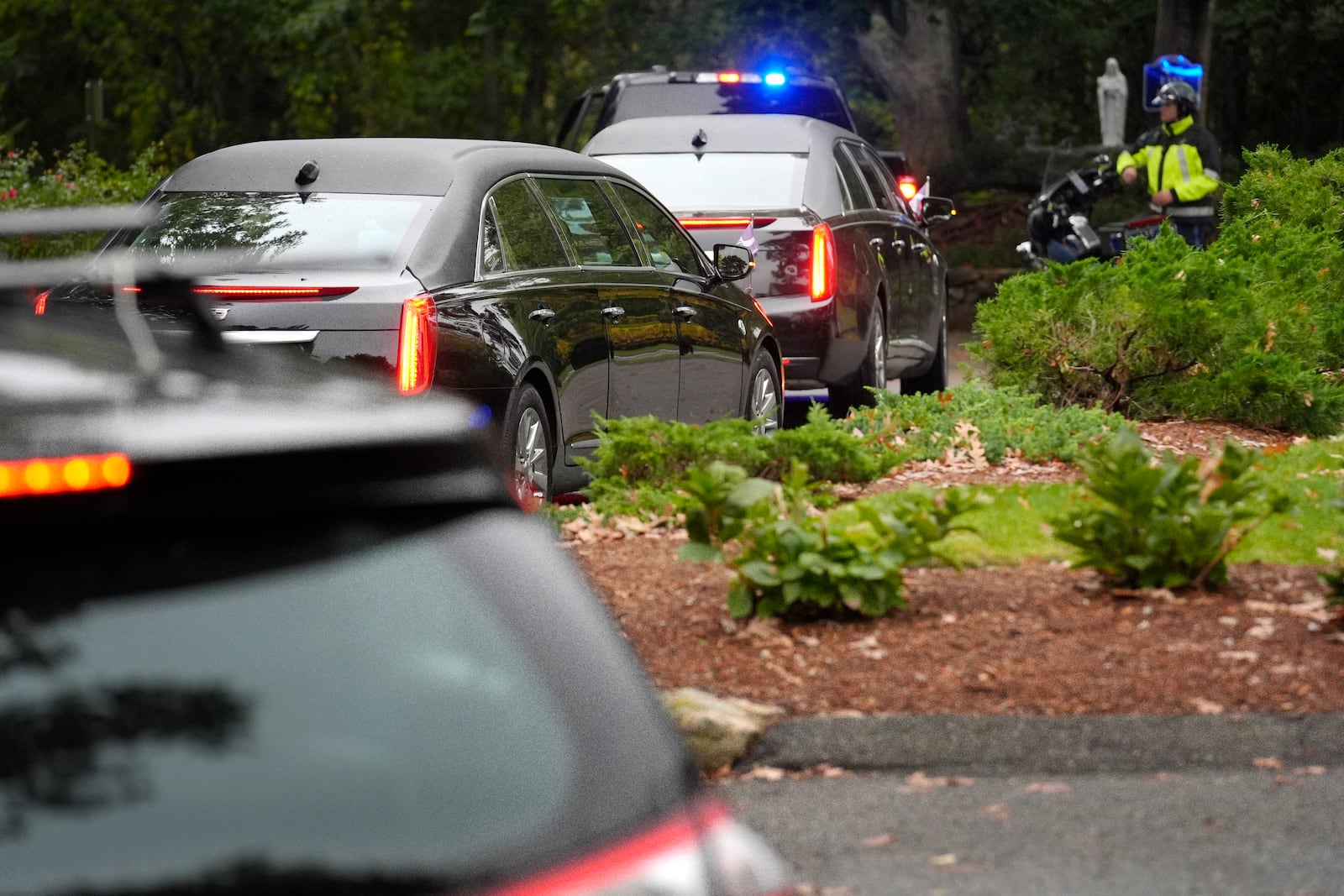 A funeral procession departs Our Lady of Victory church following services for Ethel Kennedy, wife of the late Sen. Robert F. Kennedy, Monday, Oct. 14, 2024, in Centerville, Mass. (AP Photo/Steven Senne)