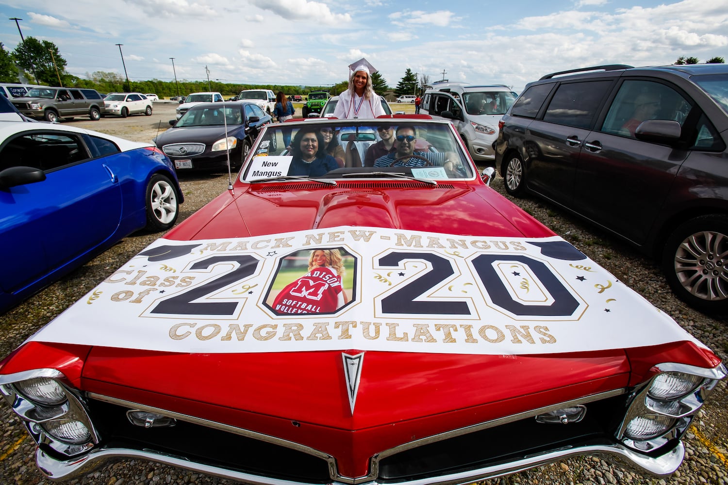 Madison High School drive-thru graduation ceremony at Land of Illusion