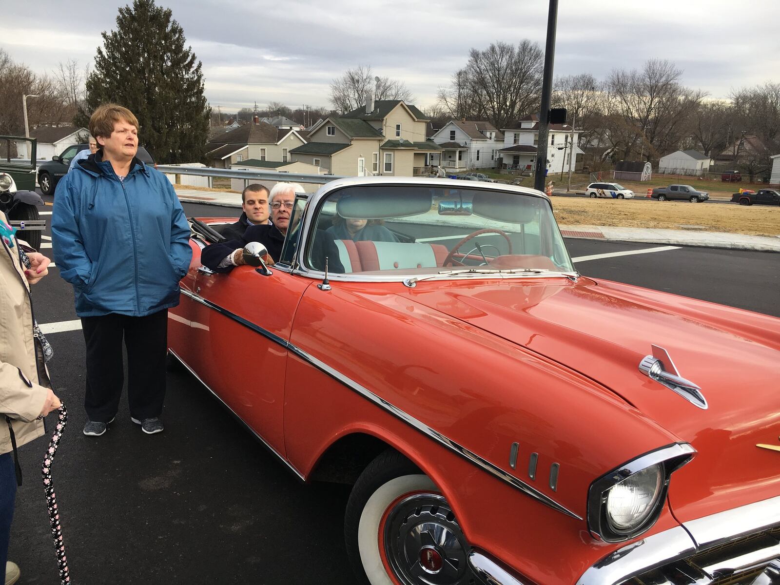 Four generations of Jim Blount’s family — his wife, Jackie Blount; daughter Lori Shook; grandson James Shook; and great-grandson, Leo Shook, 2; rode in the first vehicle to officially cross South Hamilton Crossing, which connects Ohio 4 at Grand Boulevard with the area of Miami University’s Hamilton Campus, and beyond that, the city’s West Side, without having to stop for trains. MIKE RUTLEDGE/STAFF