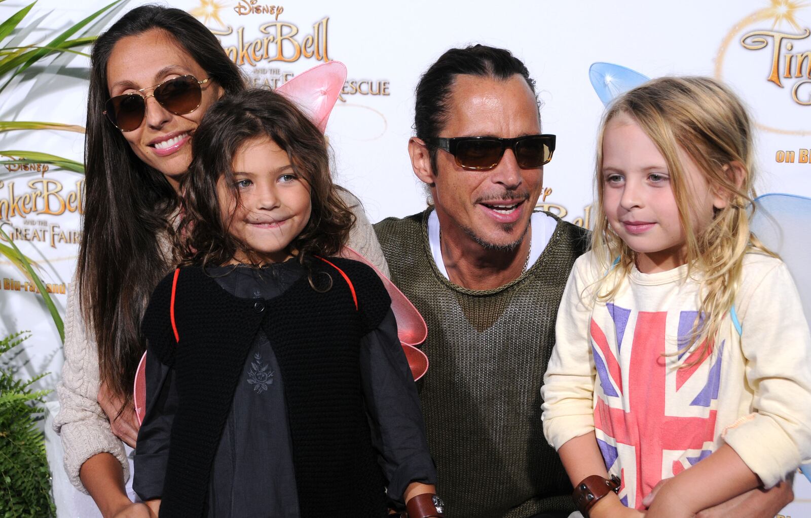 BEVERLY HILLS, CA - AUGUST 28:  Singer Chris Cornell and his wife Vicky Karayiannis and their children arrive to the special screening of "Tinker Bell And The Great Fairy Rescue" held at La Cienega Park on August 28, 2010 in Beverly Hills, California.  (Photo by Barry King/FilmMagic)