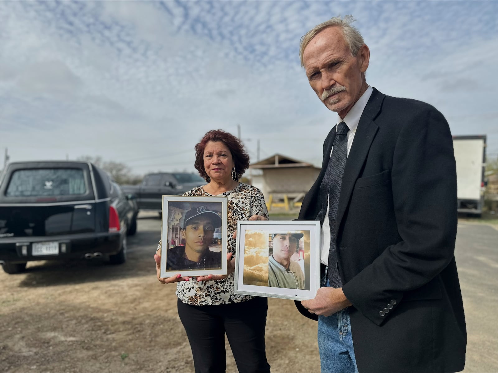 Immigration advocates hold photos of Gustavo Alfonso Garcia Olivares, during his funeral who drowned crossing the Rio Grande into the U.S. in November 2023, on Thursday, Feb. 6,2025, in Eagle Pass, Texas. (AP Photo/Valerie Gonzalez)