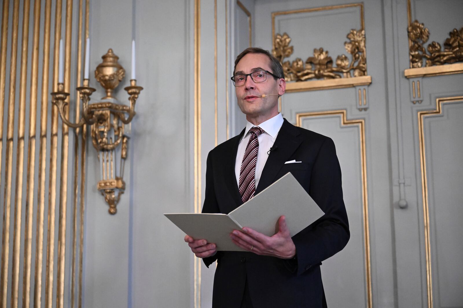 Swedish Academy's permanent secretary Mats Malm announces the winner of the 2024 Nobel Prize in Literature, South Korean writer Han Kang at the Swedish Academy in Stockholm, Sweden, Thursday Oct. 10, 2024. (Jessica Gow/TT News Agency via AP)